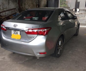 Toyota Corolla altis 1.8G AT 2015 - Cần bán gấp Toyota Corolla altis 1.8G AT 2015, màu bạc giá cạnh tranh