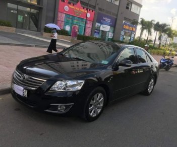 Toyota Camry 2.4G 2009 - Bán Toyota Camry 2.4G năm 2009, màu đen, xe như mới