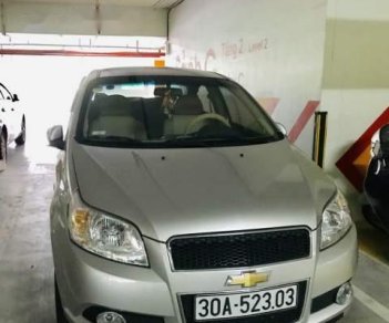 Chevrolet Aveo   2015 - Bán Chvrolet Aveo sản xuất năm 2015, màu bạc, số tự động, nội thất màu vàng be, 5 chỗ ngồi