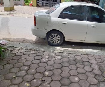 Daewoo Lanos SX 2004 - Bán lại xe Daewoo Lanos SX năm 2004, màu trắng, giá tốt