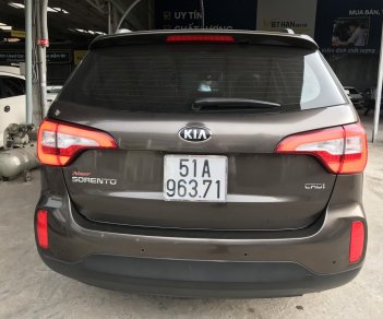 Kia Sorento Si 2.2 CRDi AT 4WD 2014 - Bán Kia New Sorento DATH 2.2AT máy dầu, số tự động, sản xuất 2014, màu nâu titan, biển Sài Gòn 1 chủ