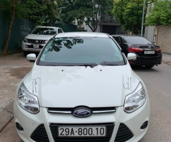 Ford Focus Trend 1.6 AT 2013 - Bán Ford Focus sản xuất năm 2013 màu trắng, xe 1 chủ đi từ đầu, được giữ gìn, bảo dưỡng định kỳ đúng hạn