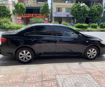 Toyota Corolla altis AT   2009 - Chính chủ bán Toyota Corolla altis AT đời 2009, màu đen, xe nhập