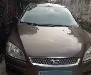 Ford Focus   2005 - Cần bán xe Ford Focus năm 2005, màu nâu, xe đã đi được 95000 km