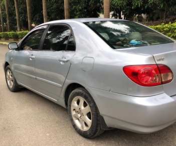 Toyota Corolla altis 2004 - Bán Toyota Corolla altis năm sản xuất 2004, màu bạc, đi êm gầm chắc, còn rất tốt