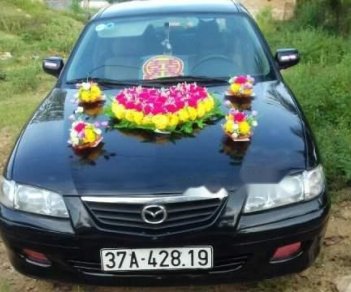 Mazda 626   2002 - Cần bán Mazda 626 sản xuất năm 2002, màu đen, nhập khẩu nguyên chiếc, xe đẹp