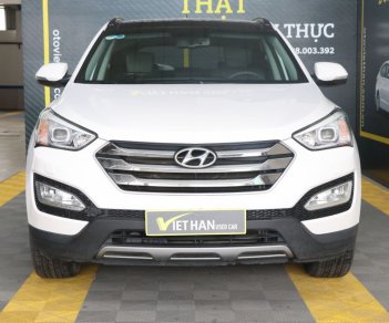 Hyundai Santa Fe 2.4AT 4WD 2015 - Bán xe Hyundai Santa Fe 2.4AT 4WD năm sản xuất 2015, màu trắng