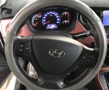 Hyundai Grand i10   1.2AT 2017 - Bán Hyundai Grand I10 sedan 1.2AT màu trắng, số tự động, sản xuất 2017, đi đúng 11000km