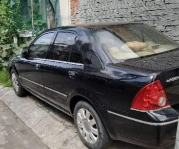 Ford Laser 2004 - Bán xe Ford Laser sản xuất 2004, màu đen