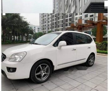 Kia Carens 2.0AT 2010 - Cần bán xe Kia Carens 2.0AT sản xuất 2010, màu trắng, xe gia đình