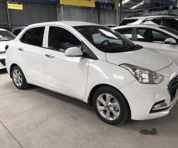 Hyundai Grand i10   1.2AT 2017 - Bán Hyundai Grand I10 sedan 1.2AT màu trắng, số tự động, sản xuất 2017, đi đúng 11000km