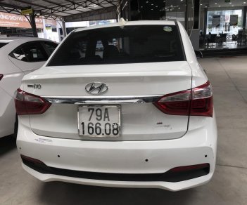 Hyundai Grand i10   1.2AT 2017 - Bán Hyundai Grand I10 sedan 1.2AT màu trắng, số tự động, sản xuất 2017, đi đúng 11000km