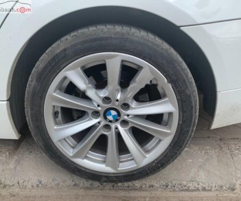 BMW 3 Series 2009 - Bán lại xe BMW 325 sản xuất 2009, màu trắng, nhập khẩu, giá tốt