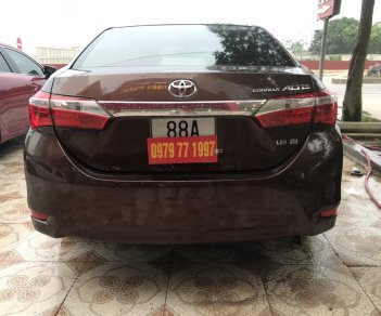 Toyota Corolla altis 1.8G AT 2015 - Bán Toyota Corolla altis màu đồng 1.8 2015