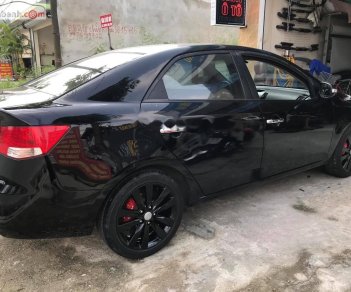 Kia Forte SLi 2009 - Bán Kia Forte SLi sản xuất năm 2009, màu đen, nhập khẩu số tự động