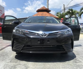 Toyota Corolla altis 2019 - Bán Altis số sàn hỗ trợ 40tr trước bạ xe 2019 Toyota Tiền Giang