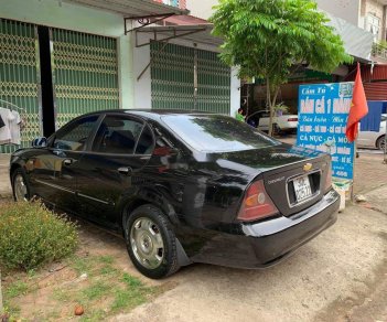 Daewoo Magnus   2004 - Cần bán lại xe cũ Daewoo Magnus năm 2004, màu đen