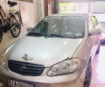 Toyota Corolla J 1.3 MT 2003 - Cần bán xe Toyota Corolla J 1.3 MT sản xuất năm 2003, màu bạc, máy móc êm