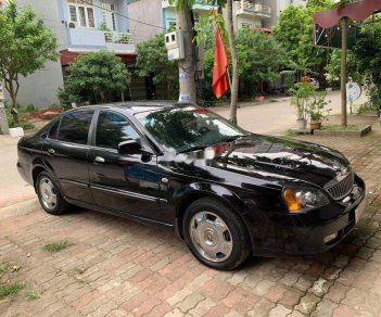 Daewoo Magnus   2004 - Cần bán lại xe cũ Daewoo Magnus năm 2004, màu đen