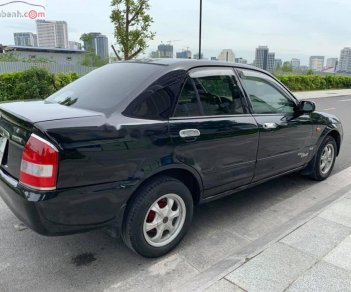 Mazda 323 2003 - Cần bán xe Mazda 323 đời 2003, màu đen, xe đẹp 