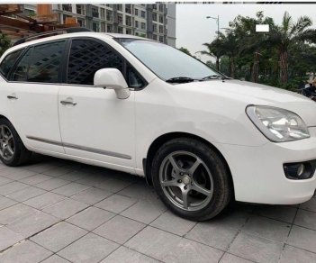 Kia Carens   2.0 AT  2010 - Cần bán Kia Carens 2.0 AT đời 2010, màu trắng chính chủ 