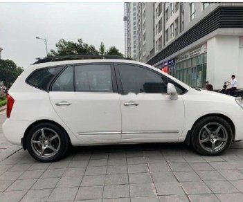 Kia Carens   2.0 AT  2010 - Cần bán Kia Carens 2.0 AT đời 2010, màu trắng chính chủ 