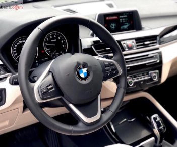 BMW X1 18i Xline 2019 - Bán xe BMW X1 18i Xline sản xuất năm 2019, màu đen, xe nhập