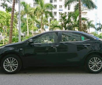 Toyota Corolla altis 1.8G AT 2015 - Bán ô tô Toyota Corolla altis 1.8G AT năm 2015, màu đen chính chủ, 630 triệu