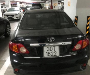 Toyota Corolla altis   2009 - Bán xe Toyota Corolla altis sản xuất năm 2009, màu đen đã đi 200.000 km