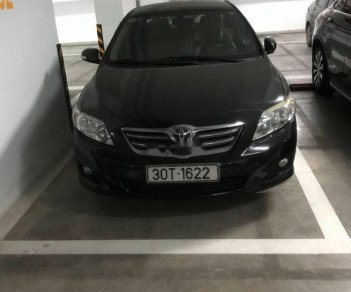 Toyota Corolla altis   2009 - Bán xe Toyota Corolla altis sản xuất năm 2009, màu đen đã đi 200.000 km