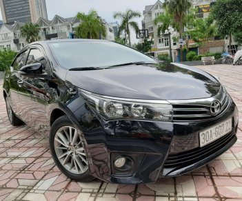 Toyota Corolla altis 1.8G 2015 - Bán Toyota Corolla altis 1.8G đời 2015, màu đen