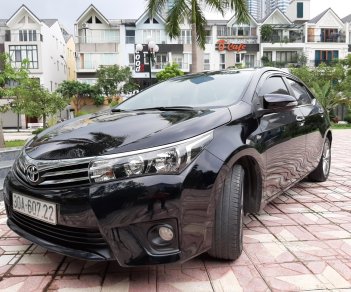 Toyota Corolla altis 1.8G 2015 - Bán Toyota Corolla altis 1.8G đời 2015, màu đen