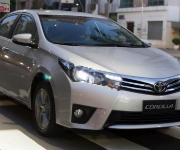 Toyota Corolla altis 1.8MT  2016 - Bán ô tô Toyota Corolla Altis 1.8MT đời 2016, màu bạc, xe như mới đi 2,1 vạn km