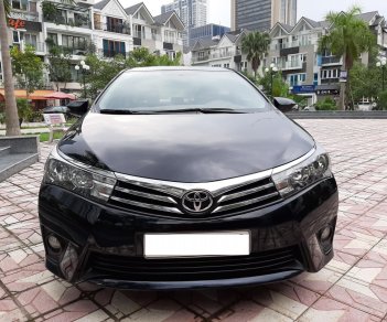 Toyota Corolla altis 1.8G AT 2015 - Bán ô tô Toyota Corolla altis 1.8G AT 2015, màu đen