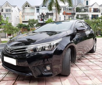 Toyota Corolla altis 1.8G AT 2015 - Bán ô tô Toyota Corolla altis 1.8G AT 2015, màu đen