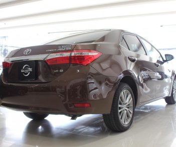 Toyota Corolla altis G 2016 - Cần bán Toyota Corolla altis G sản xuất 2016, màu nâu