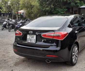 Kia K3   1.6AT 2014 - Nhu cầu đổi xe 7 chỗ nên bán Kia K3 1.6AT 2014