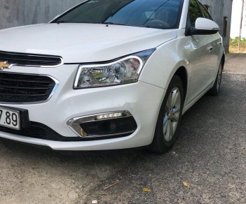 Chevrolet Cruze    LT   2016 - Bán ô tô Chevrolet Cruze LT đời 2016, màu trắng số sàn