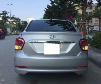 Hyundai Grand i10 2016 - Bán xe Hyundai Grand I10 1.2 Sedan 2016 số sàn màu bạc