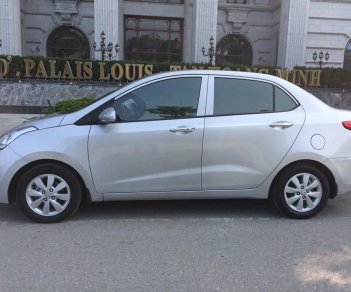 Hyundai Grand i10 2016 - Bán xe Hyundai Grand I10 1.2 Sedan 2016 số sàn màu bạc