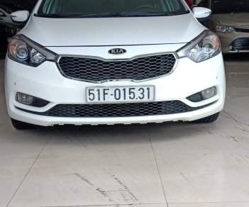 Kia K3 2.0 2014 - Cần bán Kia K3 2.0AT sản xuất 2014, màu trắng, giá 490tr