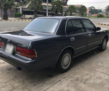 Toyota Crown 1994 - Gia đình bán Toyota Crown năm sản xuất 1994, xe nhập, màu xanh xám