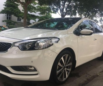 Kia K3 2014 - Chính chủ bán Kia K3 đời 2014, màu trắng