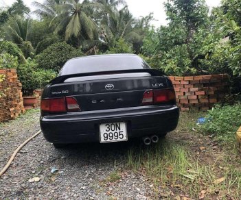 Toyota Camry 1996 - Gia đình bán Toyota Camry đời 1996, màu đen, xe nhập 