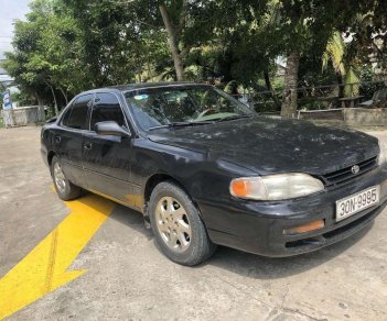 Toyota Camry 1996 - Gia đình bán Toyota Camry đời 1996, màu đen, xe nhập 