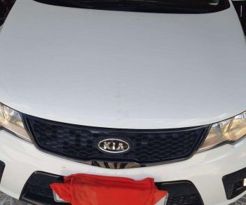 Kia Cerato   Koup 2011 - Cần bán gấp Kia Cerato Koup sản xuất năm 2011, màu trắng, xe thể thao, đèn pha auto