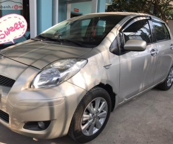 Toyota Yaris 1.3 AT 2010 - Cần bán lại xe Toyota Yaris 1.3 AT năm 2010, màu vàng, nhập khẩu 