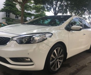 Kia K3 2.0 2014 - Bán Kia K3 2.0 sản xuất năm 2014, màu trắng chính chủ, Odo : 42000km