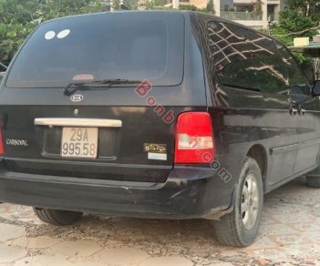 Kia Carnival   2009 - Cần bán Kia Carnival sản xuất năm 2009, màu đen, số tự động