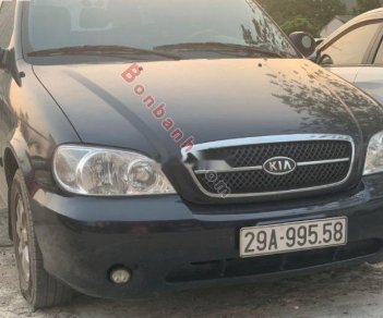 Kia Carnival   2009 - Cần bán Kia Carnival sản xuất năm 2009, màu đen, số tự động